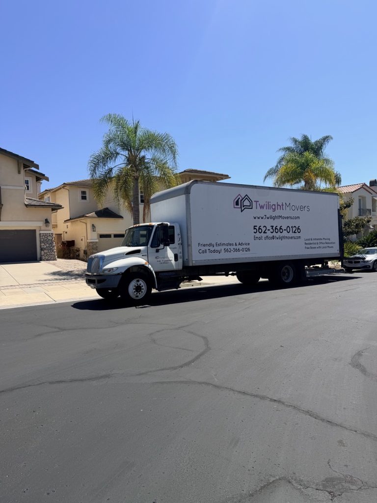 Twilight Movers moving truck parked on a residential street for a local move